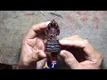 wood carving. buddha and naga make from rosewood ​ ព្រះអង្គ​ ប្រក់នាគ​ សាងពីក្រញូងអណ្តែត