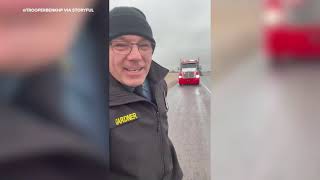 Trooper Slides Across Icy Road to Demonstrate Danger to Drivers