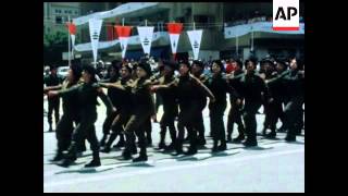 UPITN 27 5 80 PIERRE AND BACHIR GEMAYEL ATTEND A PHALANGIST RALLY IN BEIRUT