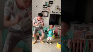 Dad teaches the baby to dance, and the baby stamps his feet anxiously!#funny #babyboy #baby