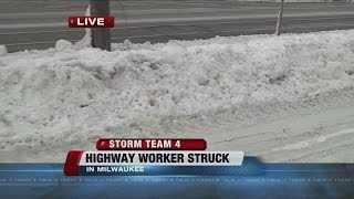 Car hits Milwaukee County worker who stopped to help woman stuck in snow