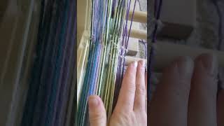 fixing mistake in my warp on the inkle loom