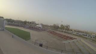 PARAMOTOR PILOT LANDING IN EVENT IN FRONT OF public