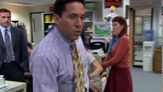 Oscar pushes Angela. Dwight gets angry