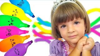 Ilaria plays with magic markers and learn colors