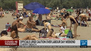 Officials urge COVID-19 caution over long weekend