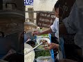 Grandpa boiled rice with chicken on boat