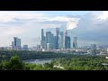 moscow city skyline in summer. sunset clouds. modern skyscrapers and old buildings.