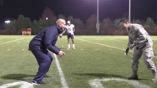 James Franklin challenges ROTC cadet to catch a pass during Penn State's practice