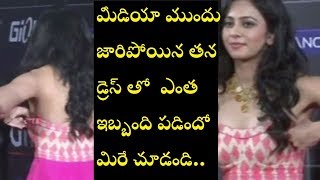 OMG! Rakul Preet Singh Top Slips At Public Event  Rakul Preet Singh Caught Adjusting Her Dress