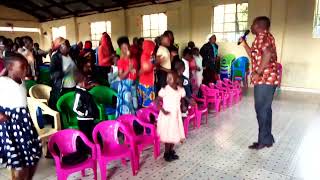 Pst Aroti performing wasitahili praise at Mogonga PAG church