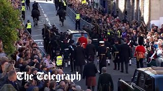 Heckler shouts at Prince Andrew during procession of late Queen's coffin
