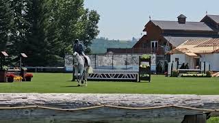 July 15, 2024 : Hunter class in the Banff grass ring at RMSJ for Ladybug with Liam in the irons.