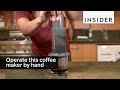 You operate this coffee maker by hand