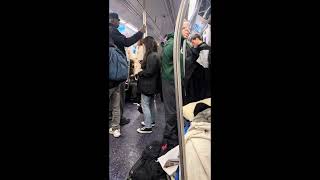 Woman take a piss on New York City crowded train like she’s at home.