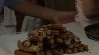 Pamplona festival goers queue for rare churros treat