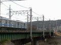 西武池袋線入間川橋梁を通過する電車