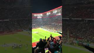 Fans singing „Country Roads“ at NFL Munich Game 2022