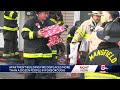 Firefighters work to save Christmas gifts from burning home