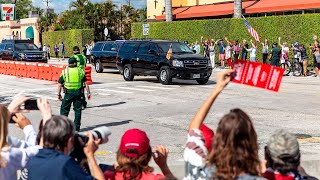 Trump greeted by chanting supporters as he arrives in Florida