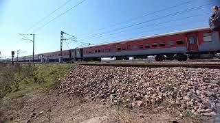 GCT 09041 Bandra Ghazipur express skipping Alniya at 120KMPH WR's RTM homed WDM3D 11481 in lead