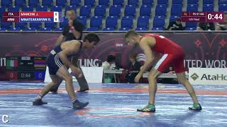 1/8 FS - 57 kg: G. MNATSAKANYAN (ARM) df. J. MANCINI (ITA), 6-4