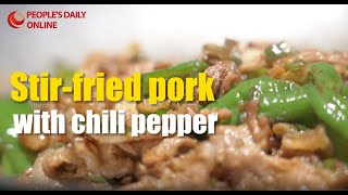 Hunan culinary delight: Stir-fried pork with chili pepper