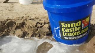 Sandcastle lessons use a split bucket as an auto filler!