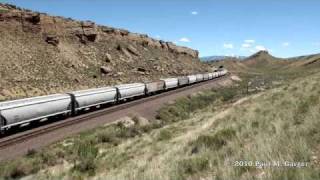 Old CNW Diesel Leads A UP Hopper Train