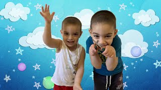 Areg and Shant are playing with styrofoam, pretending to be the strongest, doing jumps and tricks