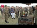 defence minister rajnath singh flaunts shooting skills gets hands on with walther firearm