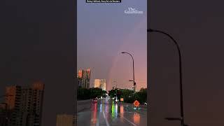 Moment lightning strikes around rainbow in Minneapolis storm