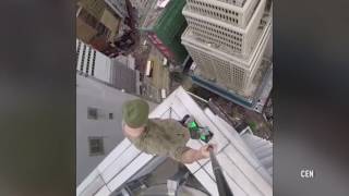 HEIGHT OF STUPIDITY: MAN'S HOVERBOARD STUNTS ON SKYSCRAPER