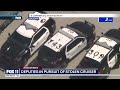 police chase authorities surround suspect in stolen police cruiser