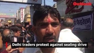 Delhi traders protest against sealing drive