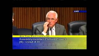 Assemblyman Clifford W. Crouch questions Human Services Commissioner Sheila Poole