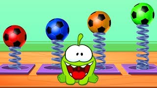 Om Nom jumps on footballs and studies colors / Learn English with Om Nom / Educational Cartoon