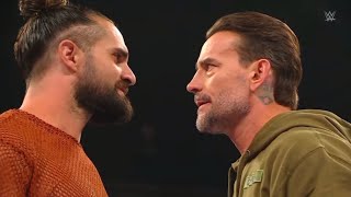 Cm punk and Seth Rollins face to face as punk is on the road to maina