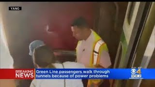 Green Line passengers walk through tunnels because of power problems