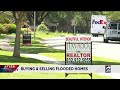 Buying and selling flooded homes