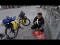 poor tour brothers bike in xinjiang freezing hands in cold winter camping in waste mining areas t