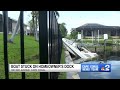 Storm launches boat onto Cape Coral homeowner's dock