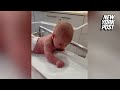 Newborn baby lifts her head and crawls at just 3 days old