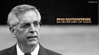 Georgia Secretary of State Brad Raffensperger speaks with election skeptic
