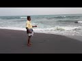 a fisherman fishing on seashore kanyakumari