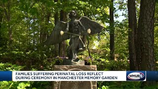 Families suffering perinatal loss reflect during ceremony in Manchester