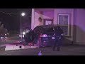 Driver flees scene after crashing into apartment building