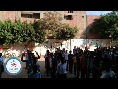 بالفيديو: طالب يلوح بشارة رابعة بالاذاعة المدرسة بكرداسة وتتحول بعدها المدرسة الى مظاهرة ضد الانقلاب 