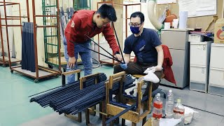 Process to paint 100,000 golf club shafts per year in a Japanese township factory.