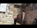 At the door of the Church of the Nativity, in Bethlehem. Tour Guide: Hind Khalid Bandak